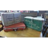 Two vintage laundry boxes and a Nomadic padded case