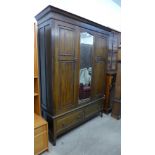 A carved oak wardrobe