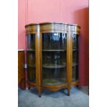 An Edward VII Sheraton Revival marquetry inlaid satinwood bow front side cabinet, 123cms h, 108cms