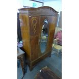 An Edward VII inlaid mahogany wardrobe