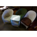 Three painted wicker chairs and a bedside table