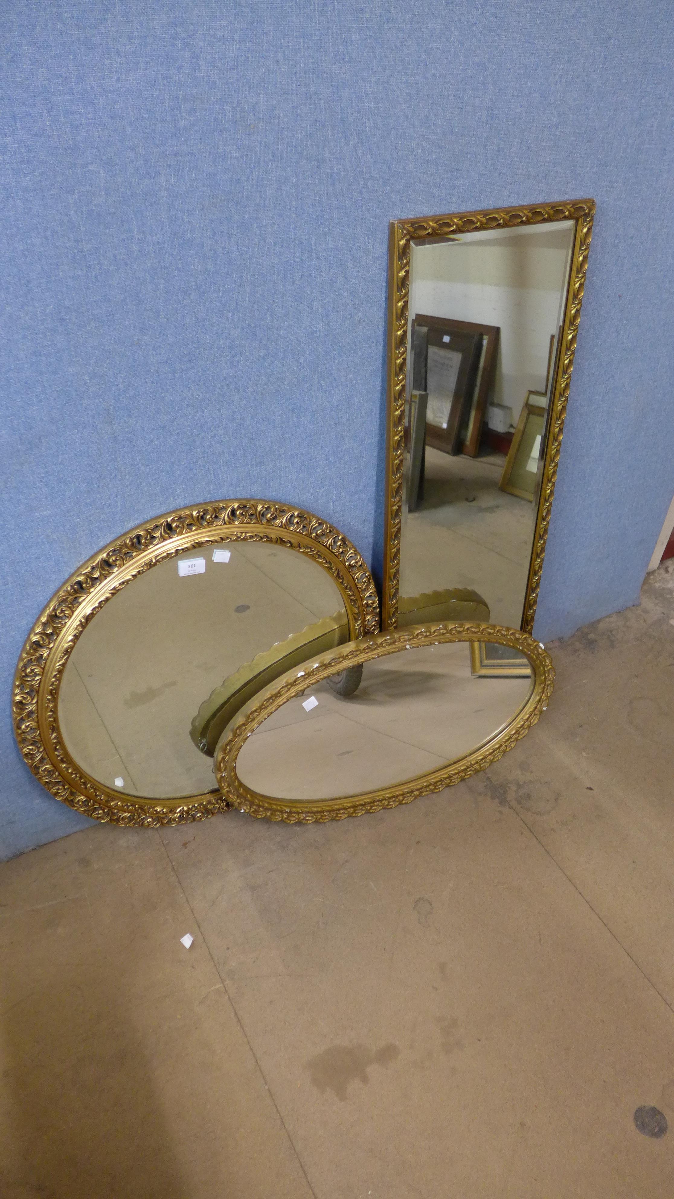 Three gilt framed mirrors