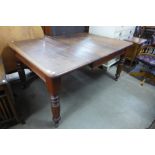 A Victorian mahogany dining table