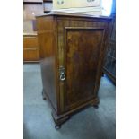 A walnut pot cupboard