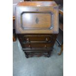 An oak barleytwist bureau