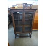 An oak barleytwist two door bookcase