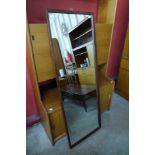 A teak framed mirror