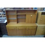 A teak highboard