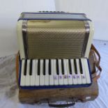 A Monika student accordion and case