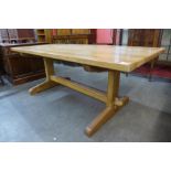 An Arts and Crafts Cotswold School walnut refectory table, 73cms h, 190cms l, 91cms w