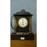 A 19th Century French Belge noir mantel clock