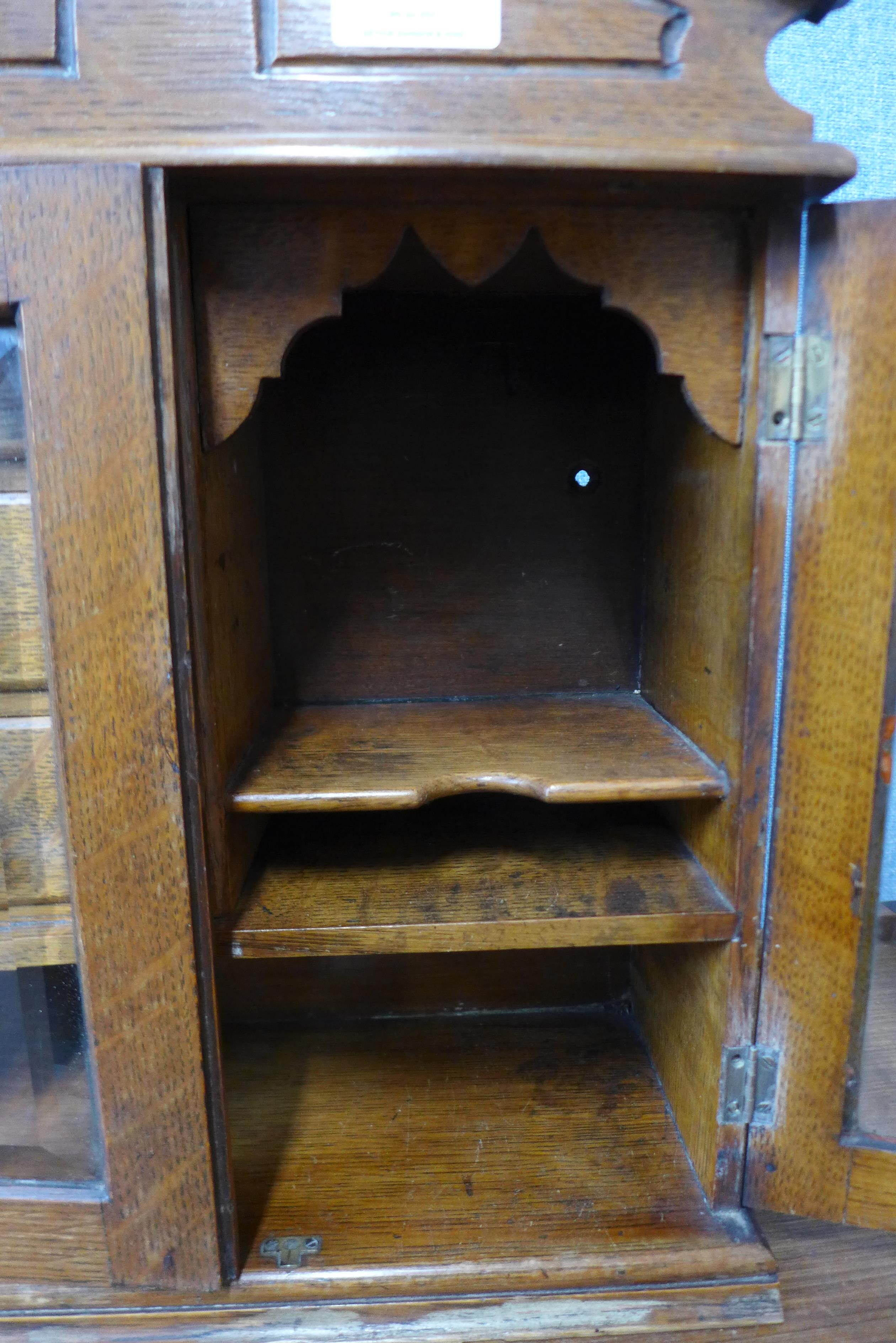 An oak smokers cabinet, bearing Wills Woodbines inscription - Image 2 of 3