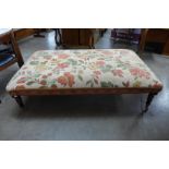 A large ex Duresta mahogany and upholstered footstool, 42cms h, 148cms l, 85cms w