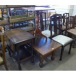 A Victorian mahogany tripod table, an oak coffee table, a drop-leaf trolley and two dining chairs
