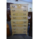 A George III style bleached walnut chest on chest