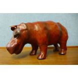 A small leather figure of a hippopotamus, 30cms l