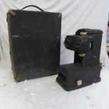 An Adiescope film strip projector, model 11, in case *sold untested