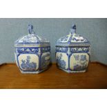 A pair of Chinese blue and white ginger jars and covers