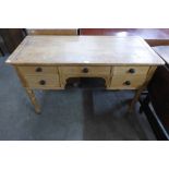 A Victorian pine side table