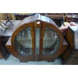 An Art Deco mahogany circular display cabinet