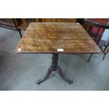 A Victorian mahogany rectangular tilt-top tripod table