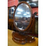 A Victorian mahogany toilet mirror, 84cms h