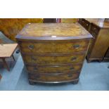 A George III style walnut bow front chest of drawers, 84cms h, 76cms w