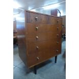 A teak chest of drawers