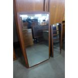 Two teak framed mirrors