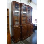 A Victorian mahogany breakfront library bookcase (lacking cornice)