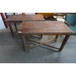 A pair of Victorian mahogany x-frame serving tables