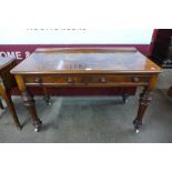 A Victorian figured walnut two drawer writing table, 77cms h, 118cms w, 58cms d
