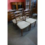 A set of four G-Plan oak dining chairs