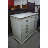 A George III painted oak chest of drawers (top adapted to lift up)