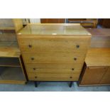 An Austin Suite oak chest of drawers