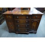 A Regency style flame figured mahogany dwarf sideboard, 77cms h, 105cms w