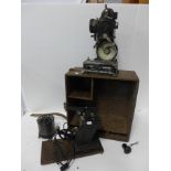 A Pathescope Pre-War 1931 9.5mm cinefilm projector and a Pathescope 'Kid' with original wooden