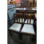 A set of four oak dining chairs