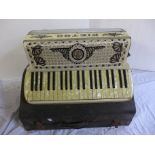 A Pietro Italia accordion and case