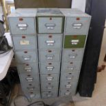 Three sets of seven card file cabinets