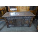 A 17th Century style carved oak blanket box, 58cms h, 108cms w, 46cms d