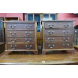 A pair of small George III style walnut chests of drawers, 59cms h x 58cms w