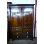 A George III mahogany linen press, 209cms h, 132cms w, 65cms d