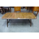 An Ercol Golden Dawn elm coffee table