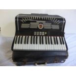 A Calvi Parma Accordion and case