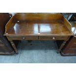 A Victorian walnut two drawer serving table