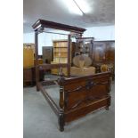 A Victorian mahogany half tester bed