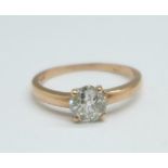 A 14k gold and diamond solitaire ring, approximately 0.75carat diamond weight, 1.8g, P