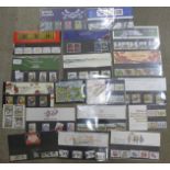 Seventeen presentation packs of GB mint stamps, Royal Mail and Post Office, one miniature sheet