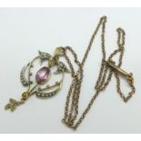 An Art Nouveau amethyst and pearl pendant on a rolled gold chain
